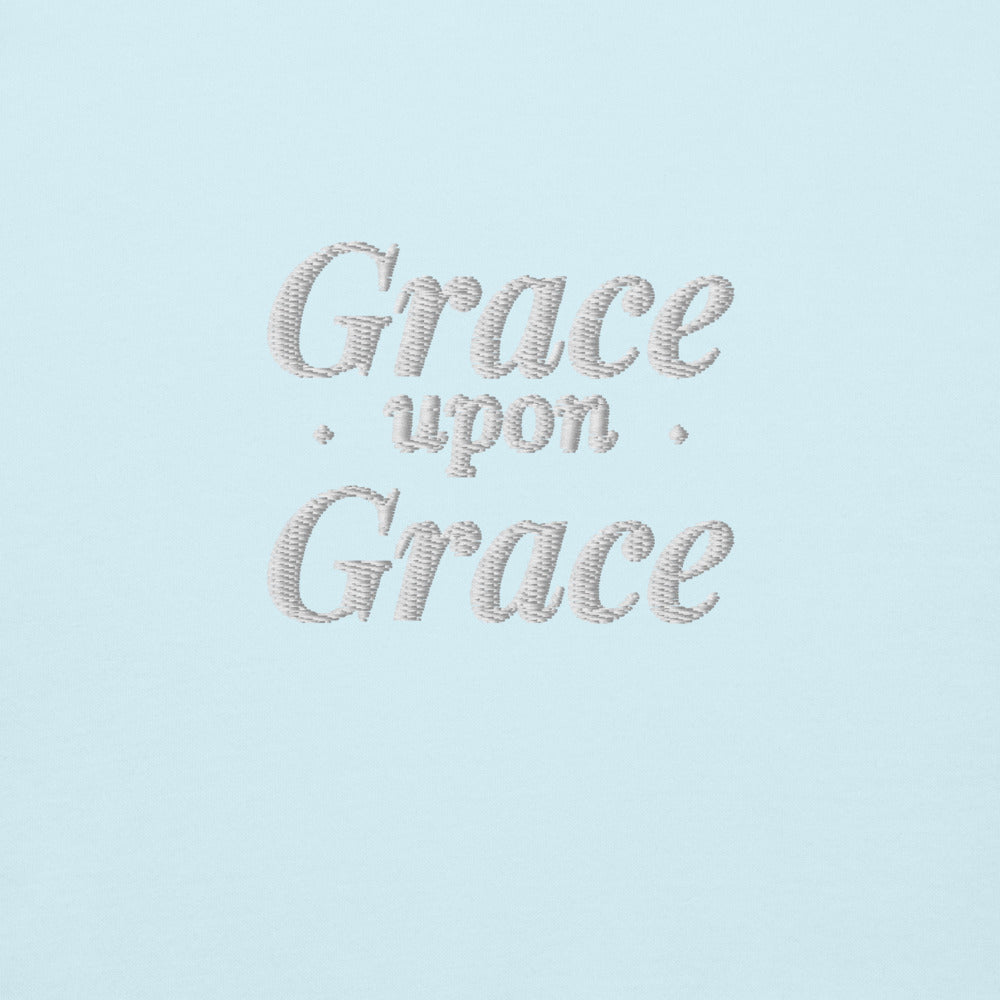 Grace Upon Grace Embroidered Crewneck Sweatshirt in Sky Blue, front view, worn.