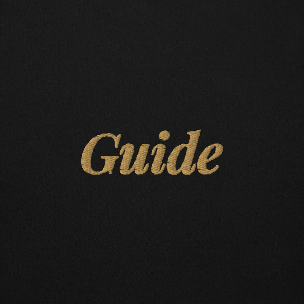 Guide Embroidered Hoodie in Black, close-up of the front embroidery.