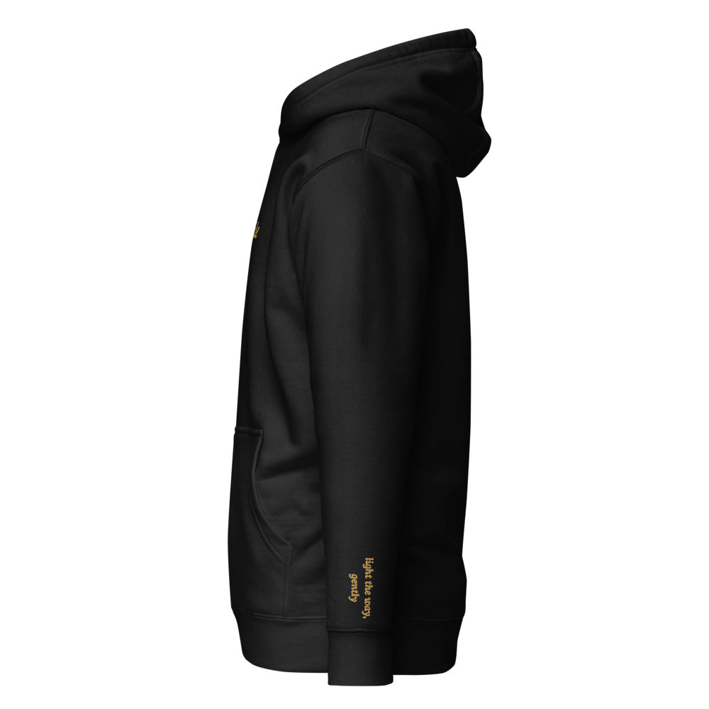 Guide Embroidered Hoodie in Black, left wrist embroidery.