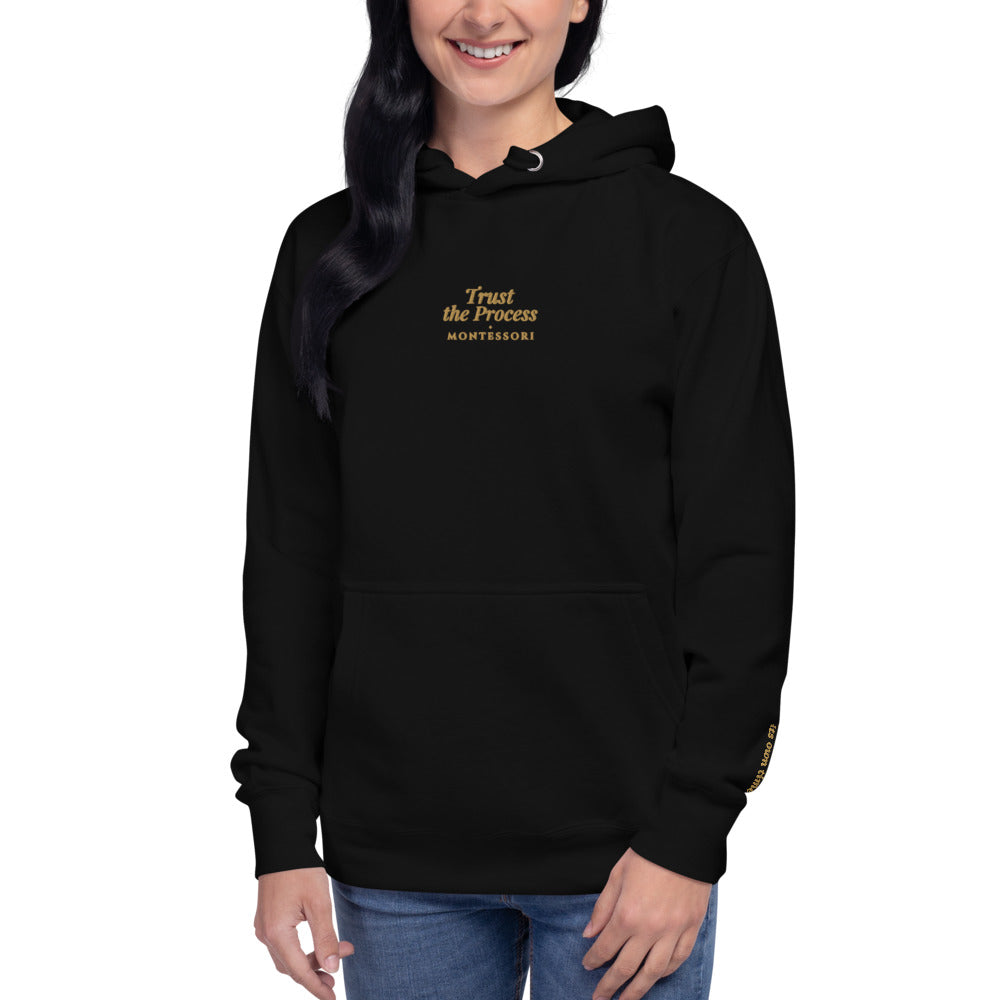 Trust the Process Embroidered Hoodie in Black, front view, worn.