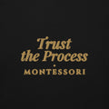 Trust the Process Embroidered Hoodie in Black, close-up of the front embroidery.