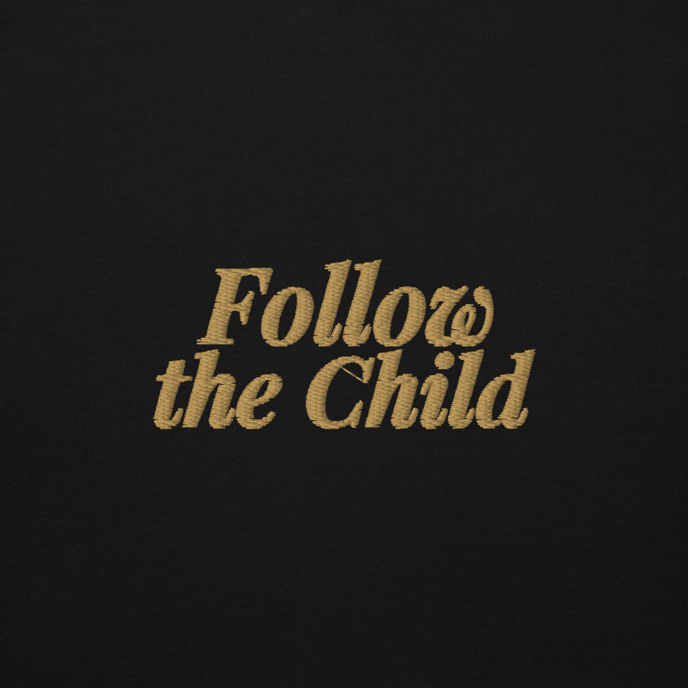 Follow the Child Embroidered Hoodie in Black, close-up of the front embroidery.