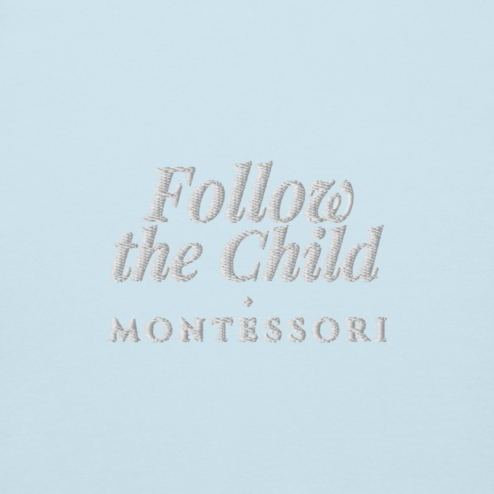 Follow the Child Embroidered Hoodie in Sky Blue, close-up of the front embroidery.