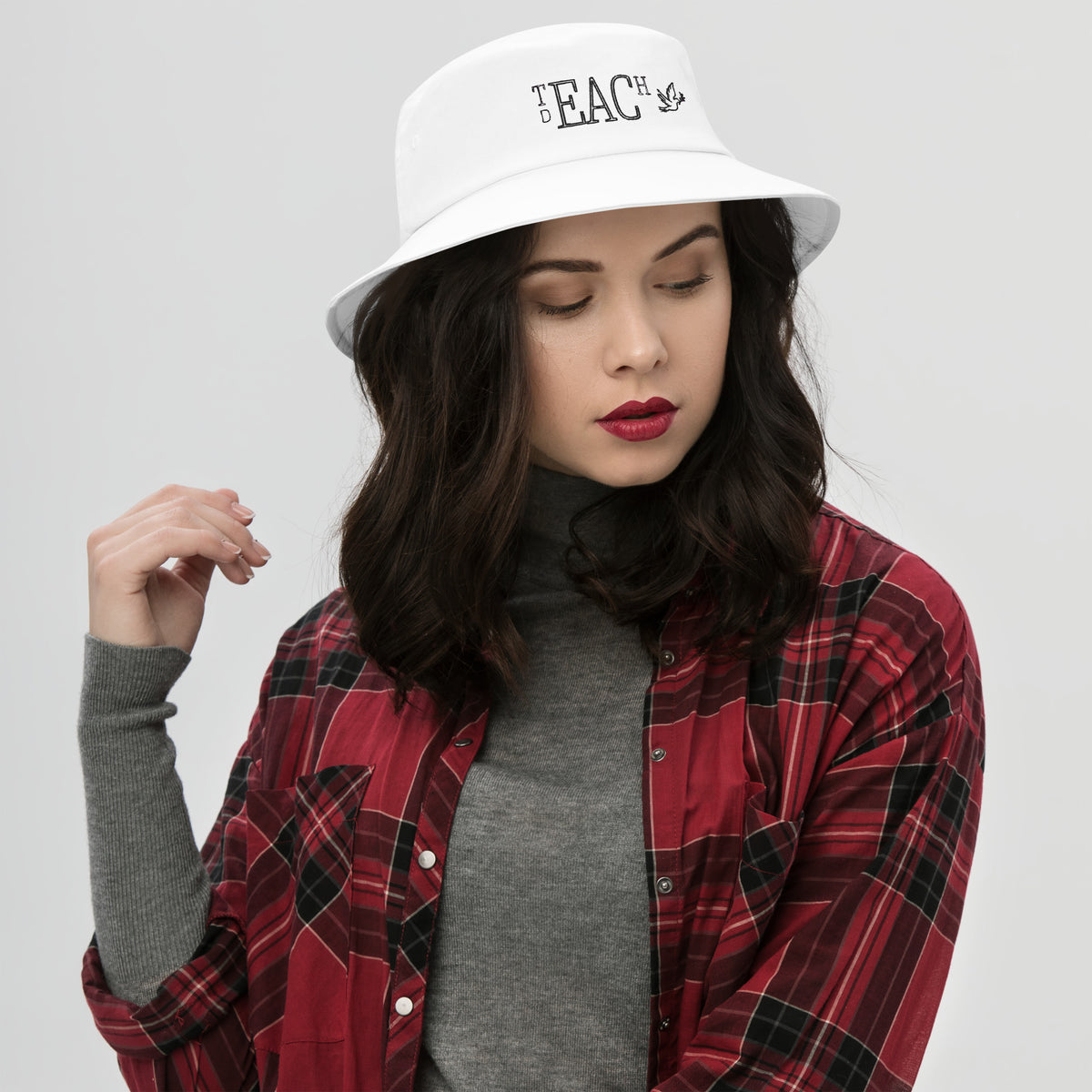 Teach Peace Embroidered Bucket Hat in White, front view