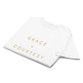 Grace + Courtesy Minimalist Women's Softstyle Tee in White, front view